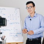 School teacher conducting online class