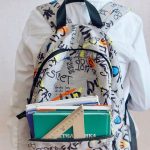student-from-behind-wearing-school-bag-2022-05-22-01-44-27-utc